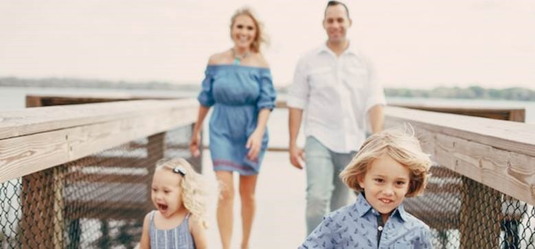 Free photo young family on the street